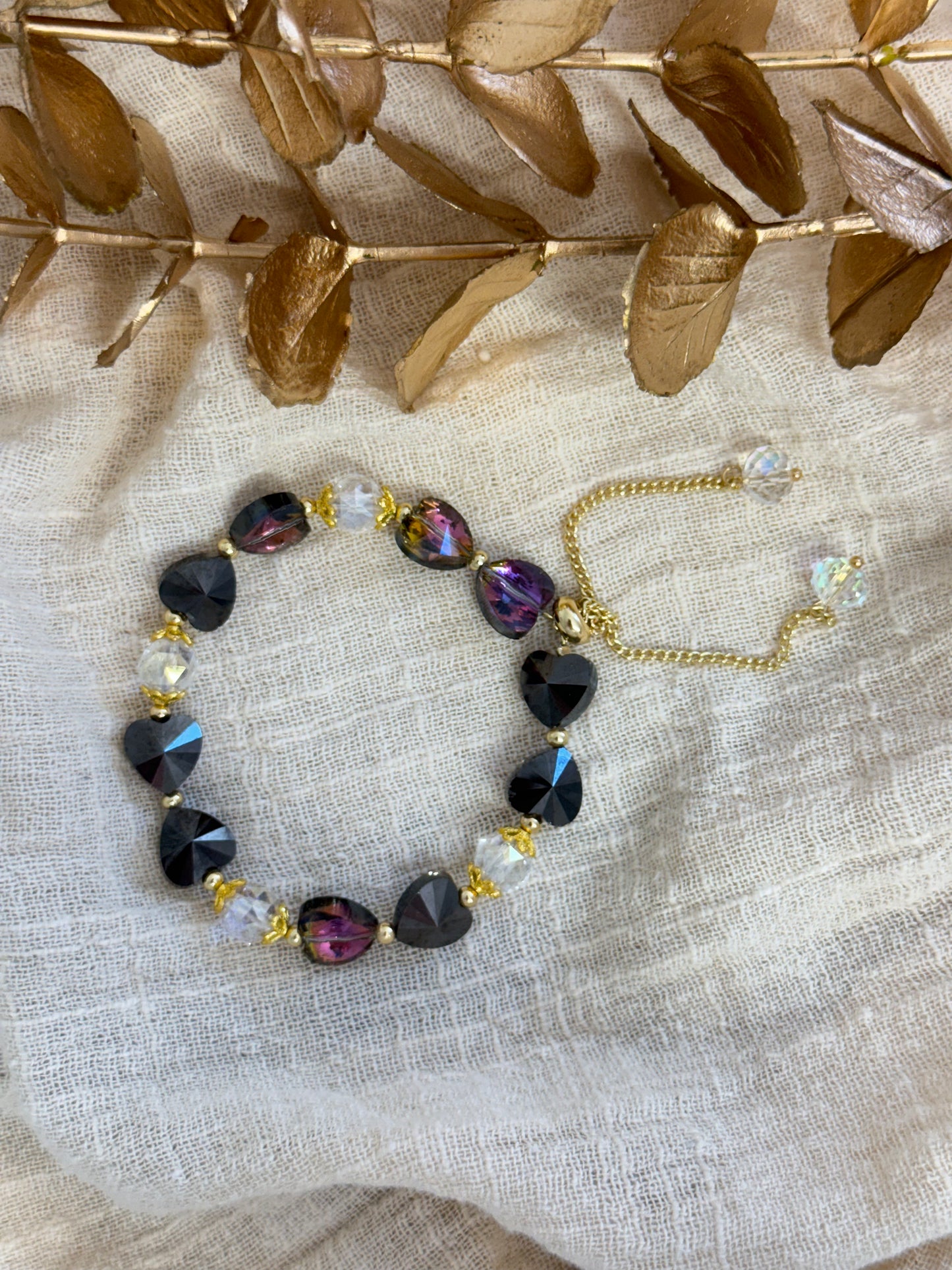 timeless jewellery, perfect gift for her, elegant jewellery, dainty jewellery, simple jewellery, classic gold bracelet, fashion accessories, sleek jewellery, trendy jewellery, lightweight bracelet, stylish jewellery, simple bracelet, dangling bracelet, dangle, multicolored bracelet, beaded bracelet
heart bracelet, purple hearts bracelet, purple beads bracelet