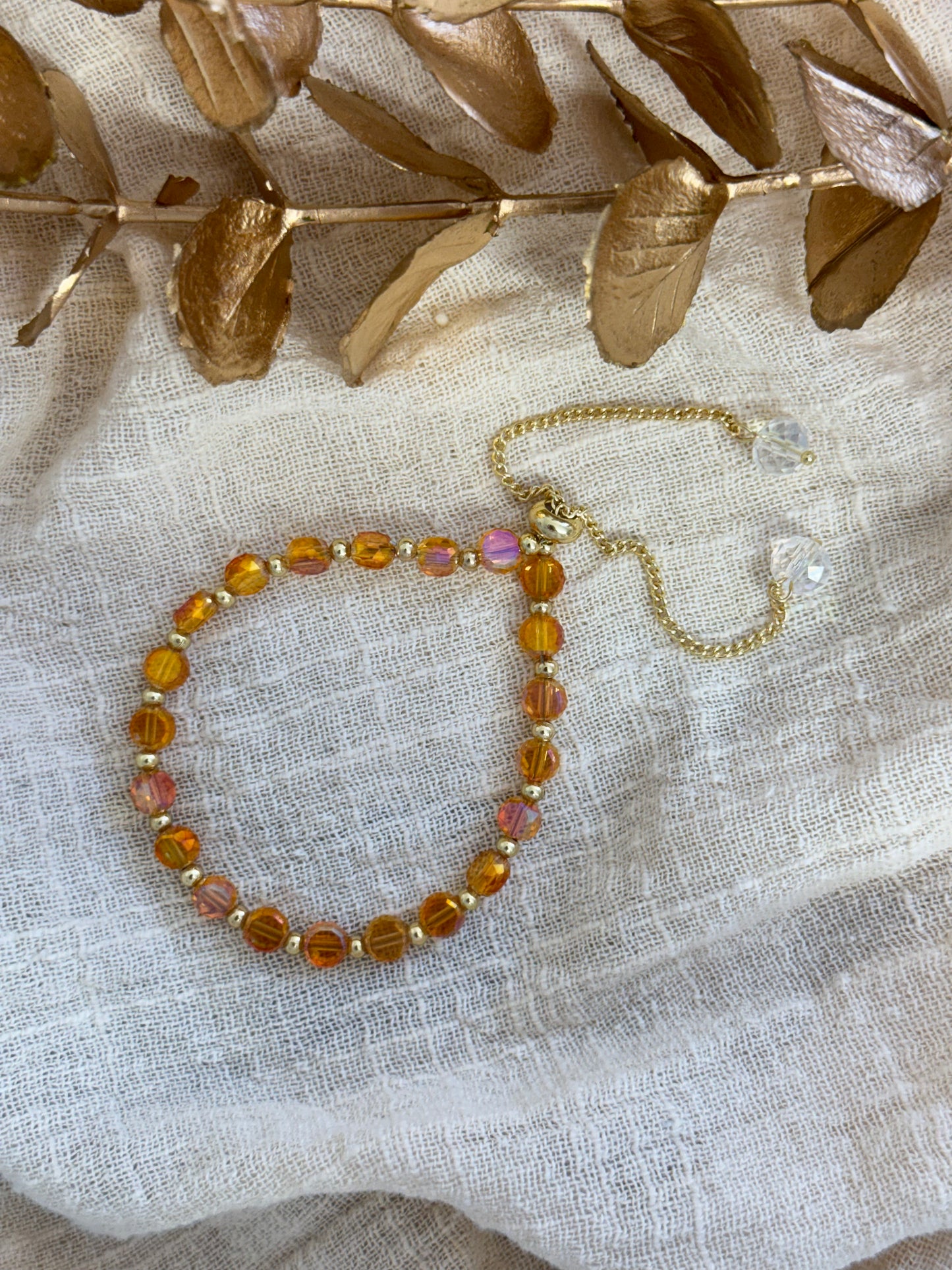 timeless jewellery, perfect gift for her, elegant jewellery, dainty jewellery, simple jewellery, classic gold bracelet, fashion accessories, sleek jewellery, trendy jewellery, lightweight bracelet, stylish jewellery, simple bracelet, dangling bracelet, dangle, multicolored bracelet, beaded bracelet
yellow bracelet, orange bracelet, yellow and orange beads bracelet