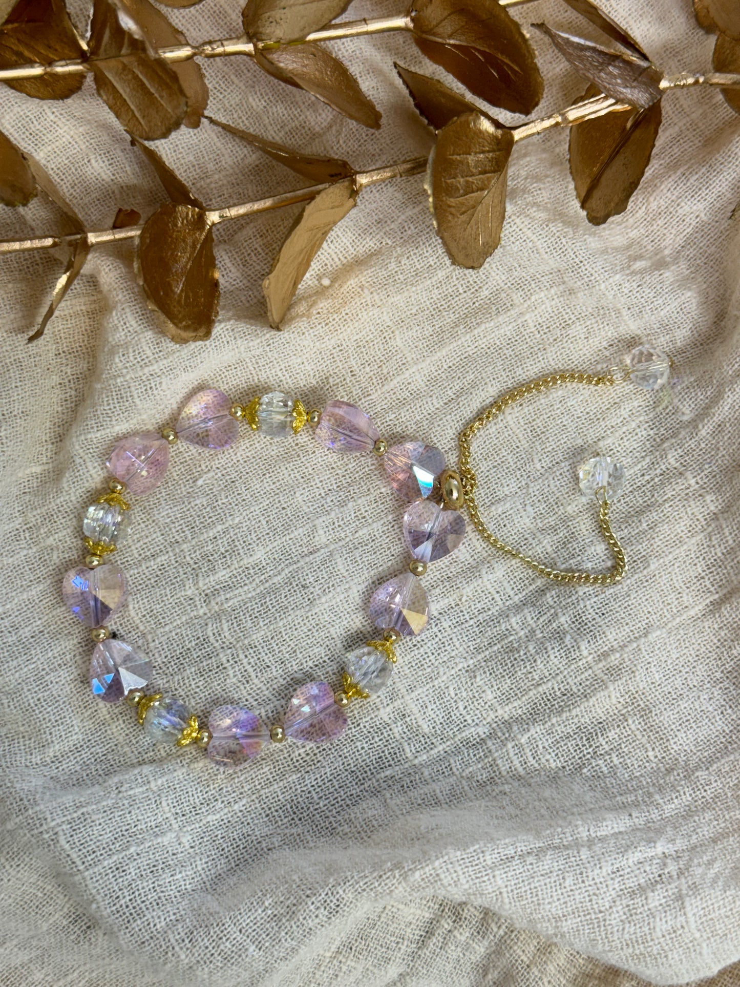 timeless jewellery, perfect gift for her, elegant jewellery, dainty jewellery, simple jewellery, classic gold bracelet, fashion accessories, sleek jewellery, trendy jewellery, lightweight bracelet, stylish jewellery, simple bracelet, dangling bracelet, dangle, multicolored bracelet, beaded bracelet
heart bead bracelet, light purple bracelet, purple beads bracelet