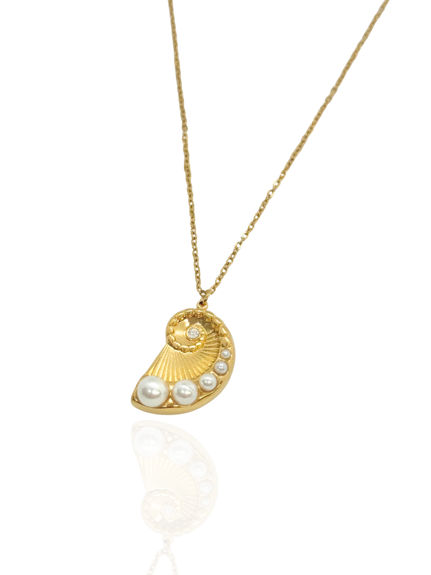 Gold necklace with a shell pendant featuring pearls on a white background, beach themed, ocean inspired, summer wear, pearl charms, shell gold pendant
