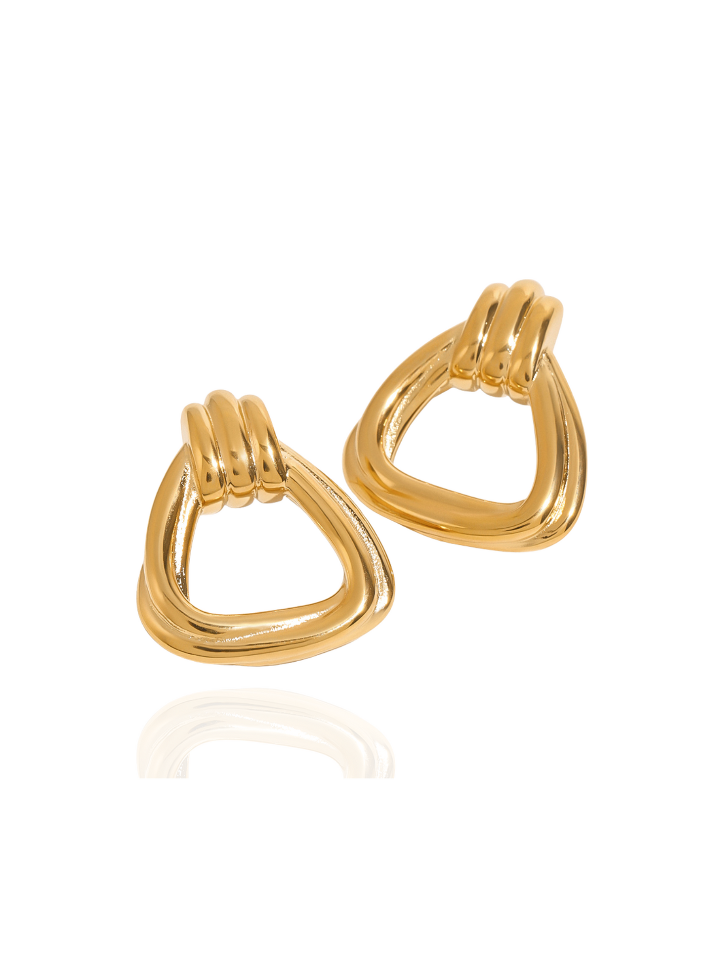 Pair of gold huggie earrings on a white background, dainty gold huggies, small gold huggie earrings, everyday gold huggies