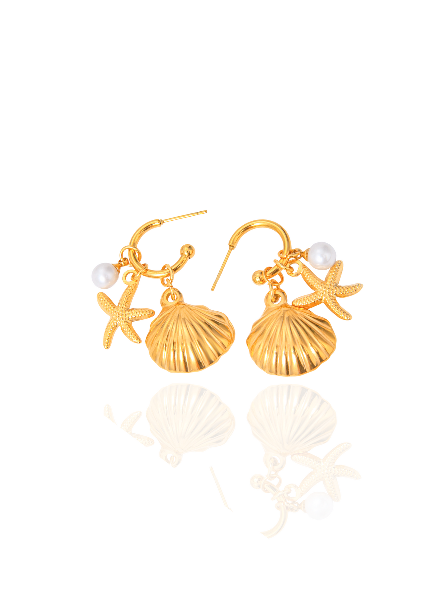 Gold earrings with shell and starfish designs on a white background, beach themed gold earrings, summer inspired studs, summer wear, ocean inspired gold huggies