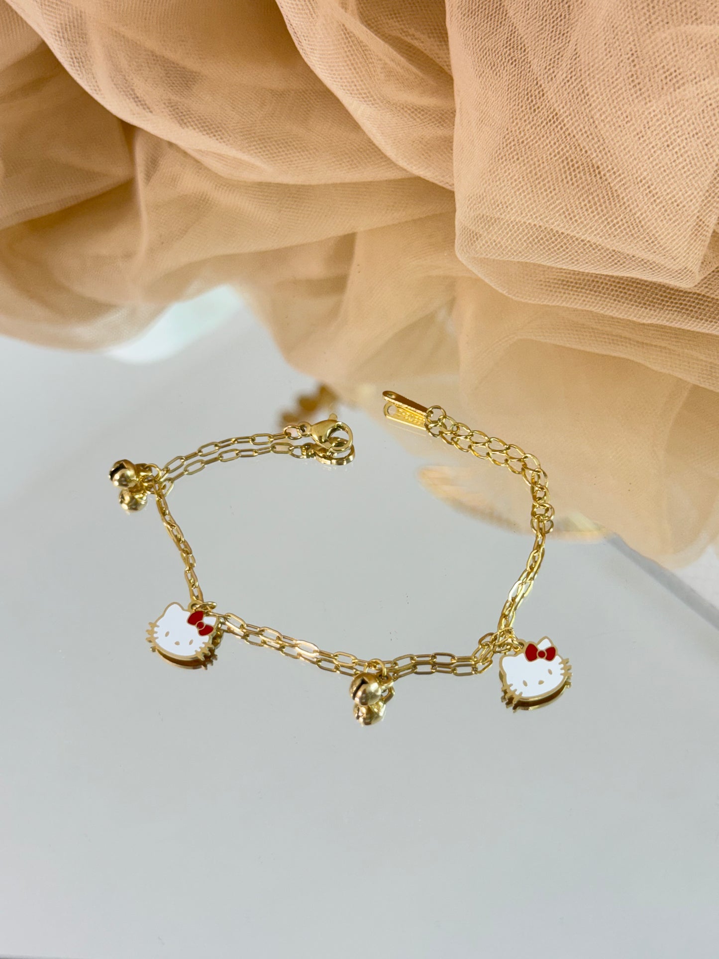 timeless jewellery, perfect gift for her, elegant jewellery, dainty jewellery, simple jewellery, classic gold bracelet, fashion accessories, sleek jewellery, trendy jewellery, lightweight bracelet, stylish jewellery, simple bracelet, dangling bracelet, dangle bracelet, hello kitty bracelet, bracelet for kids