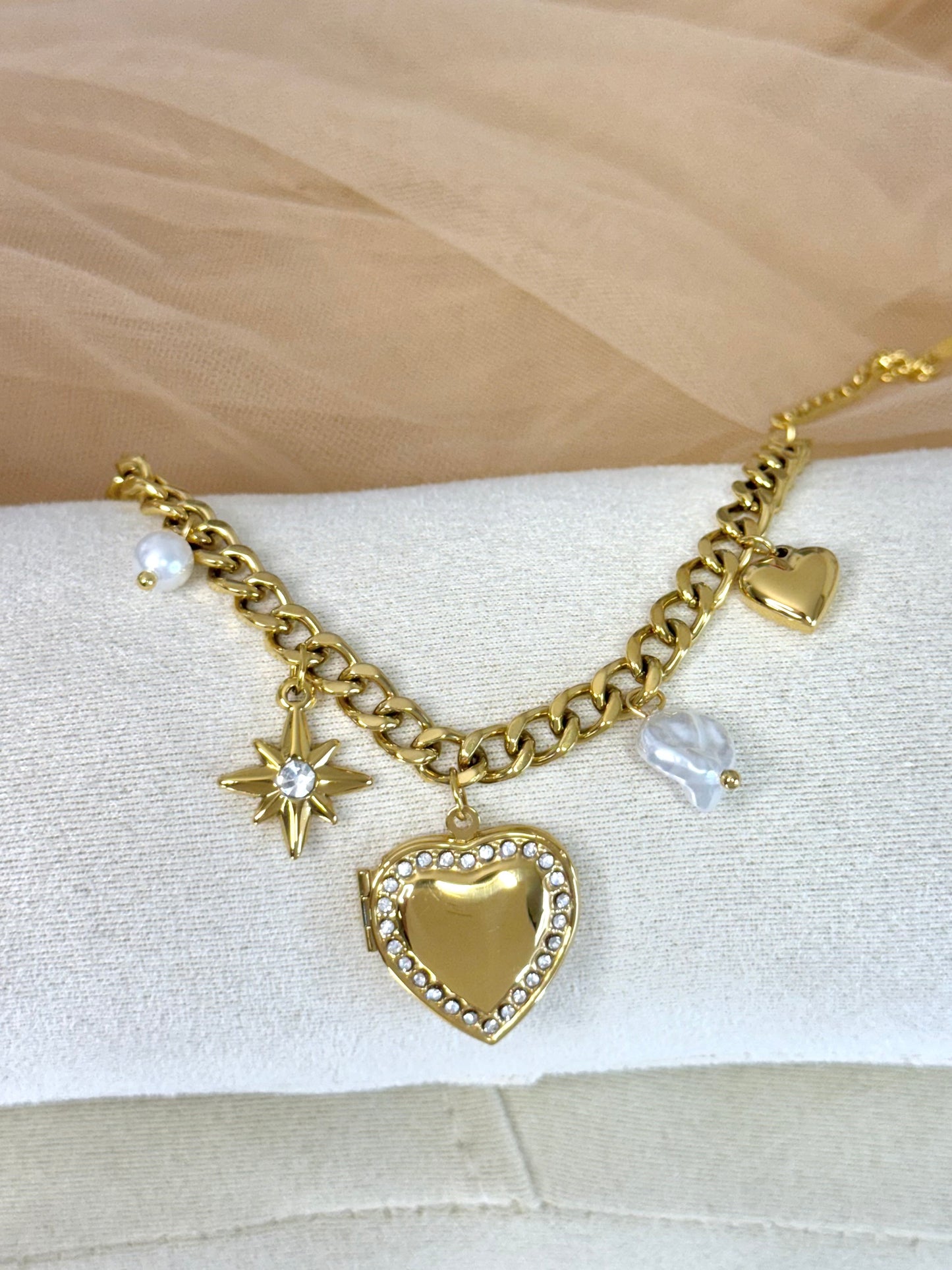timeless jewellery, perfect gift for her, elegant bracelet, charm bracelet, best gift for her, classic gold chain bracelet, stylish gift, statement bracelet, versatile bracelet, bracelet Australia, gold bracelet, lucky charm, cute bracelet, dangling bracelet, bow design bracelet, heart design bracelet, star design bracelet, pearl bracelet