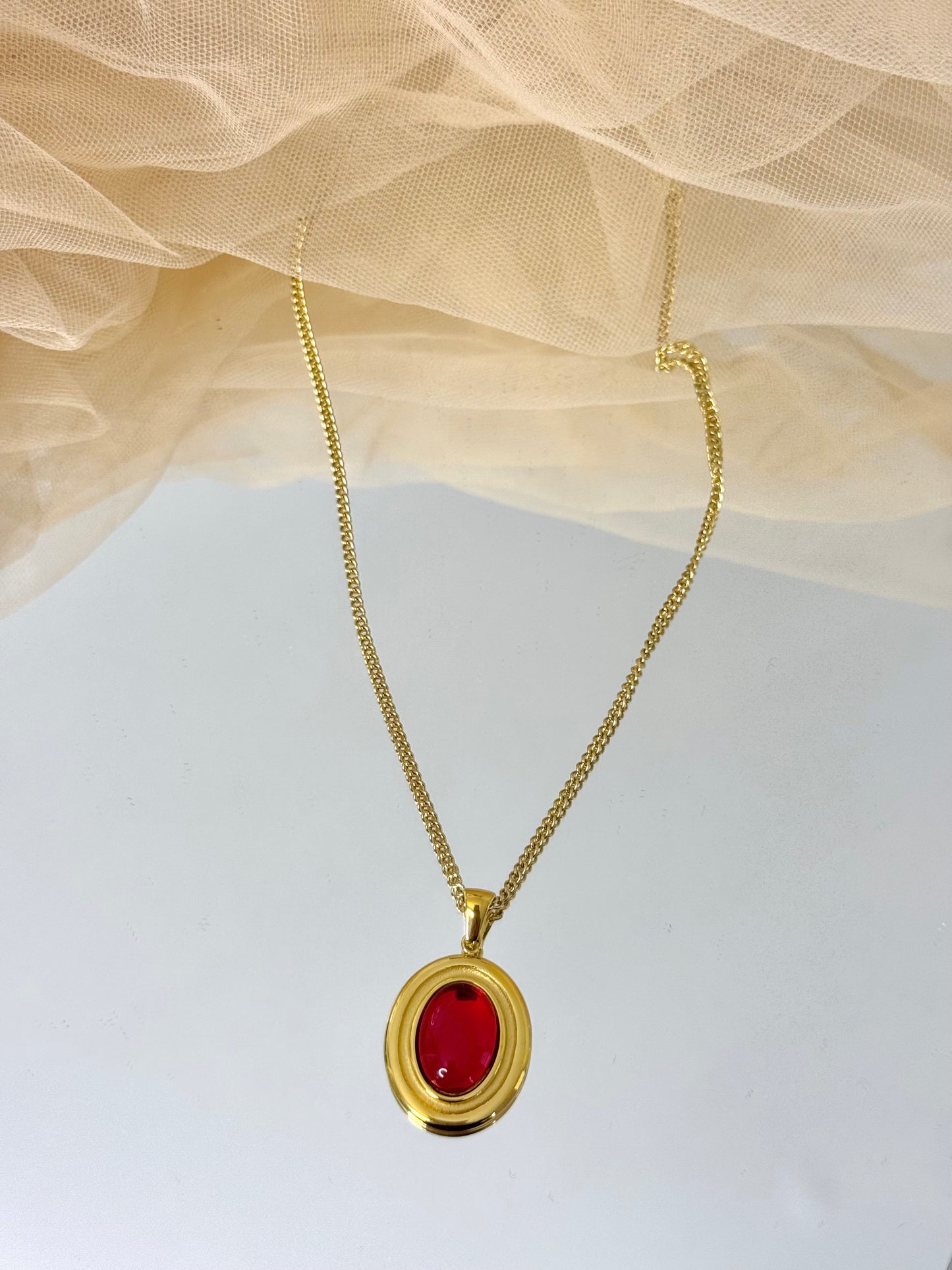 timeless jewellery, perfect gift for her, elegant necklace, charm necklace, best gift for her, classic gold chain necklace, stylish gift, statement necklace, versatile necklace, necklace Australia, y-shaped necklace, link chain necklace, necklace with minimal stones, simple necklace, bold pendant, gold necklace with bold pendant, red pendant necklace
