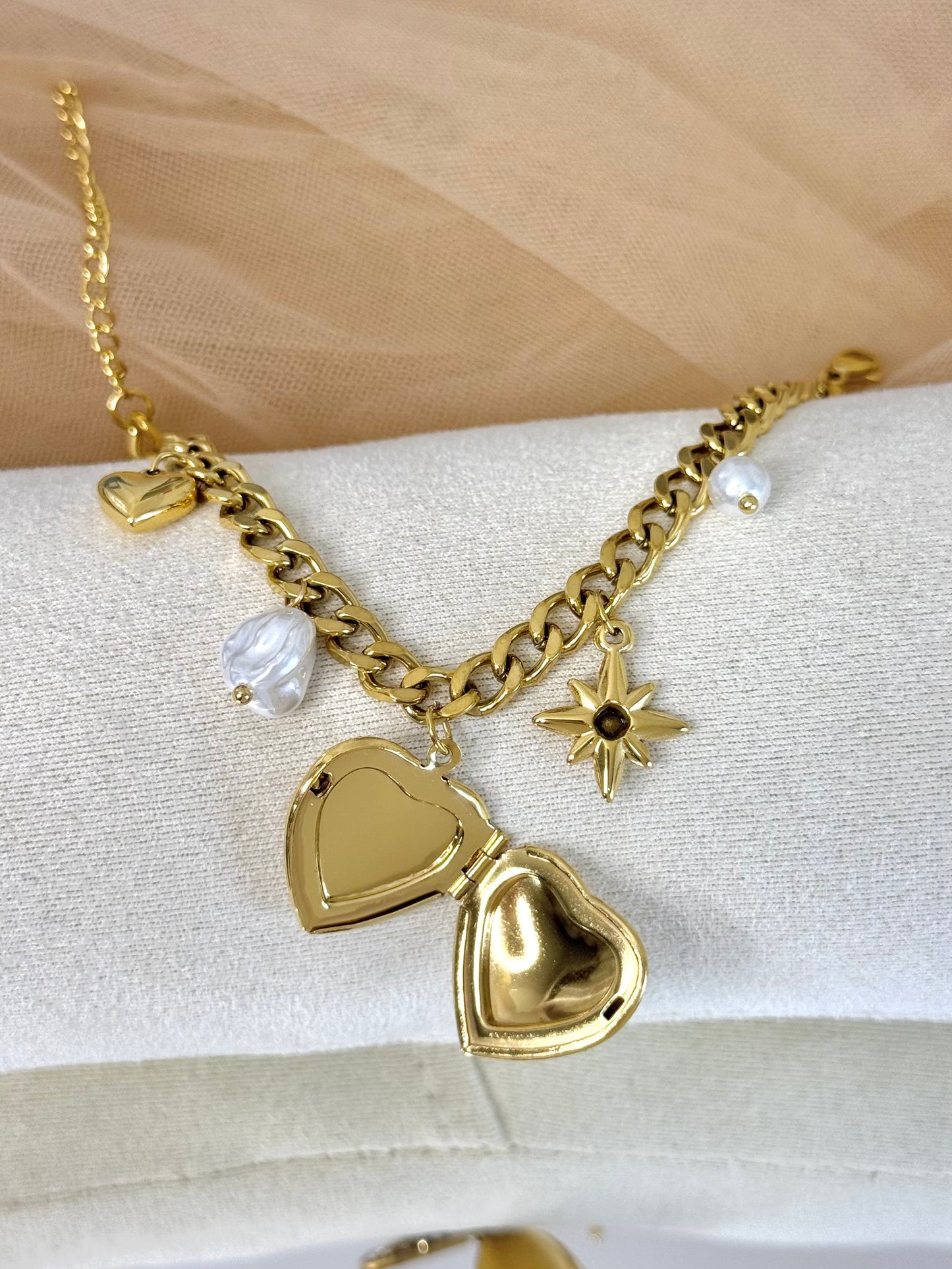 timeless jewellery, perfect gift for her, elegant bracelet, charm bracelet, best gift for her, classic gold chain bracelet, stylish gift, statement bracelet, versatile bracelet, bracelet Australia, gold bracelet, lucky charm, cute bracelet, dangling bracelet, bow design bracelet, heart design bracelet, star design bracelet, pearl bracelet