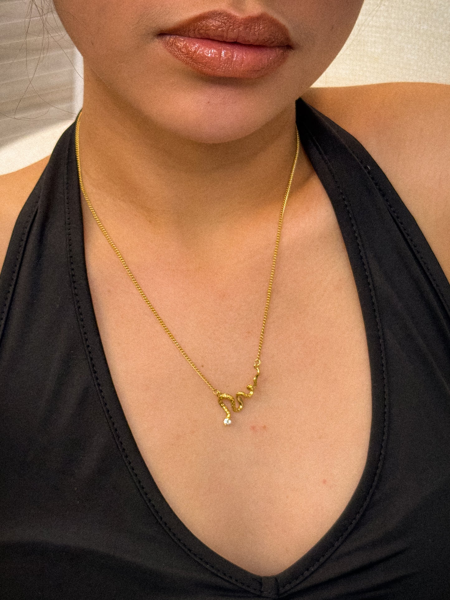 gold necklace, timeless jewellery, perfect gift for her, elegant necklace, charm necklace, best gift for her, classic gold chain necklace, stylish gift, statement necklace, versatile necklace, necklace Australia, link chain necklace, interlocking pendant necklace, y-shaped necklace, necklace with stone pendant, necklace with bold pendant, pendant with stones, necklace with gem pendant, necklace with colored stone pendant, gem necklace, unique design necklace, serpent pendant necklace