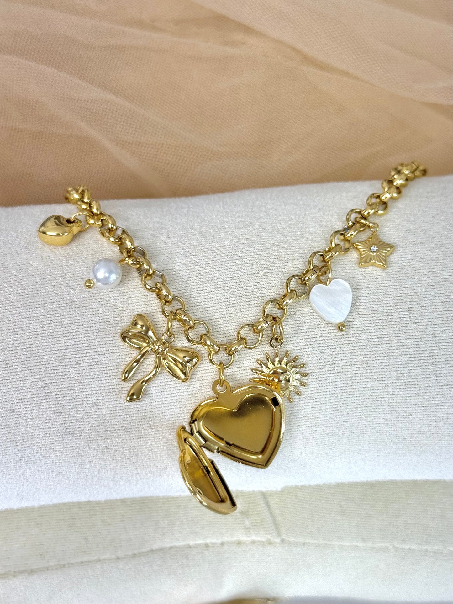 timeless jewellery, perfect gift for her, elegant bracelet, charm bracelet, best gift for her, classic gold chain bracelet, stylish gift, statement bracelet, versatile bracelet, bracelet Australia, gold bracelet, lucky charm, cute bracelet, dangling bracelet, bow design bracelet, heart design bracelet, star design bracelet, pearl bracelet