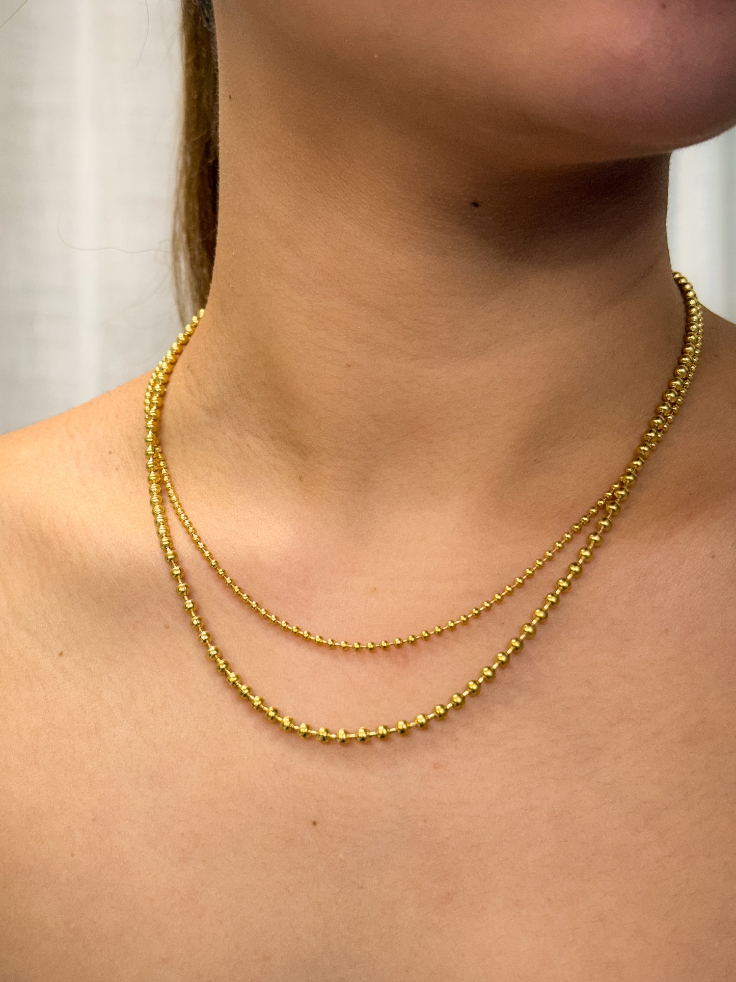gold necklace, timeless jewellery, perfect gift for her, elegant necklace, charm necklace, best gift for her, classic gold chain necklace, stylish gift, statement necklace, versatile necklace, necklace Australia, link chain necklace, interlocking pendant necklace, y-shaped necklace, necklace with stone pendant, necklace with bold pendant, pendant with stones, necklace with gem pendant, ball chain necklace, layered necklace