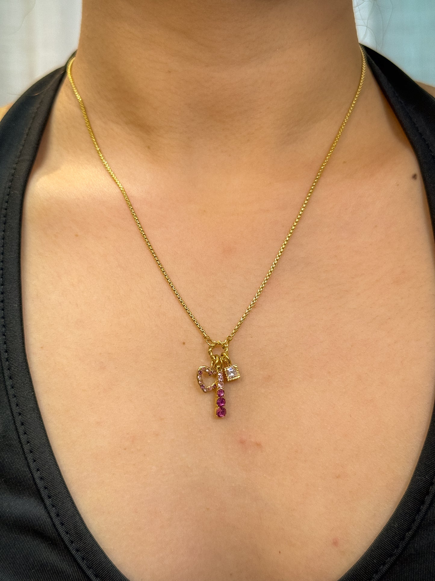 gold necklace, timeless jewellery, perfect gift for her, elegant necklace, charm necklace, best gift for her, classic gold chain necklace, stylish gift, statement necklace, versatile necklace, necklace Australia, link chain necklace, interlocking pendant necklace, y-shaped necklace, necklace with stone pendant, necklace with bold pendant, pendant with stones, necklace with gem pendant, necklace with colored stone pendant, gem necklace, unique design necklace, heart pendant necklace, charm necklace