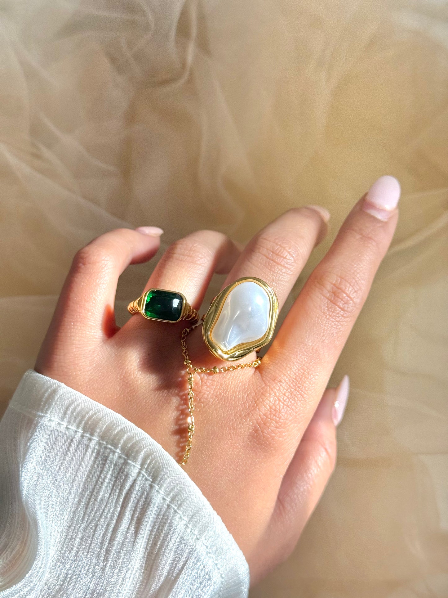 timeless jewellery, perfect gift for her, elegant ring, dainty jewellery, simple jewellery, fashion accessories, sleek jewellery, trendy jewellery, statement ring, stylish ring, cute ring, dainty ring, stud earrings, bold ring, gold ring, green ring, twisted band ring, twisted design ring, emerald green stone ring, green ring, white pearl ring, pearl ring