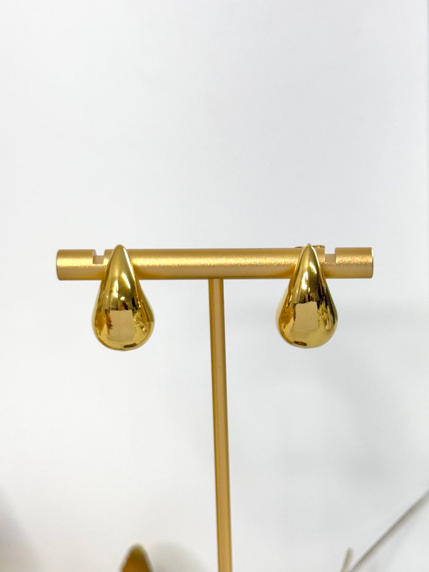 gold teardrop earrings, tear earrings, teardrop, tear drop design, statement earrings