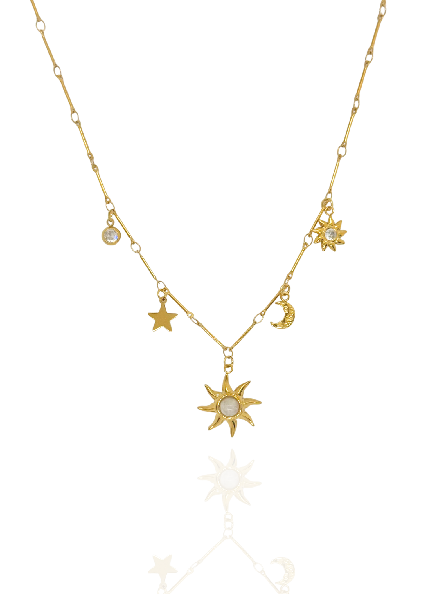 Gold necklace with star, moon, and sun pendants on a white background, celestial necklace, sun charms, star pendant, crescent moon, everyday wear