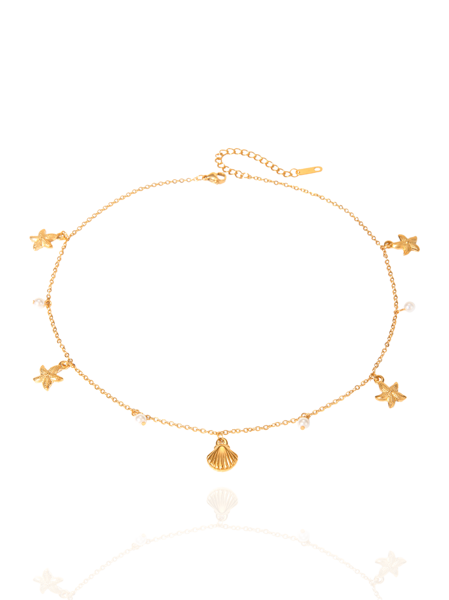 Gold necklace with star and shell pendants on a white background, sea inspired treasure necklace, summer wear, beach jewellery, star pendants, shell charms