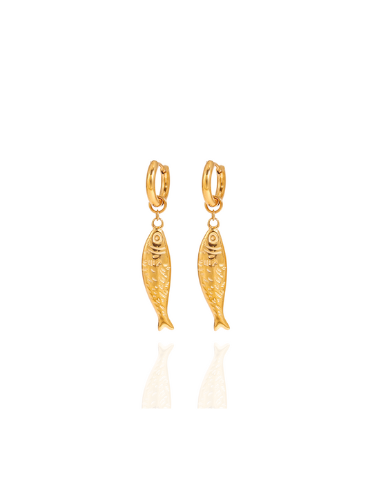 Gold fish-shaped earrings on a white background, fish huggies, dainty fish huggies gold, ocean inspired jewellery