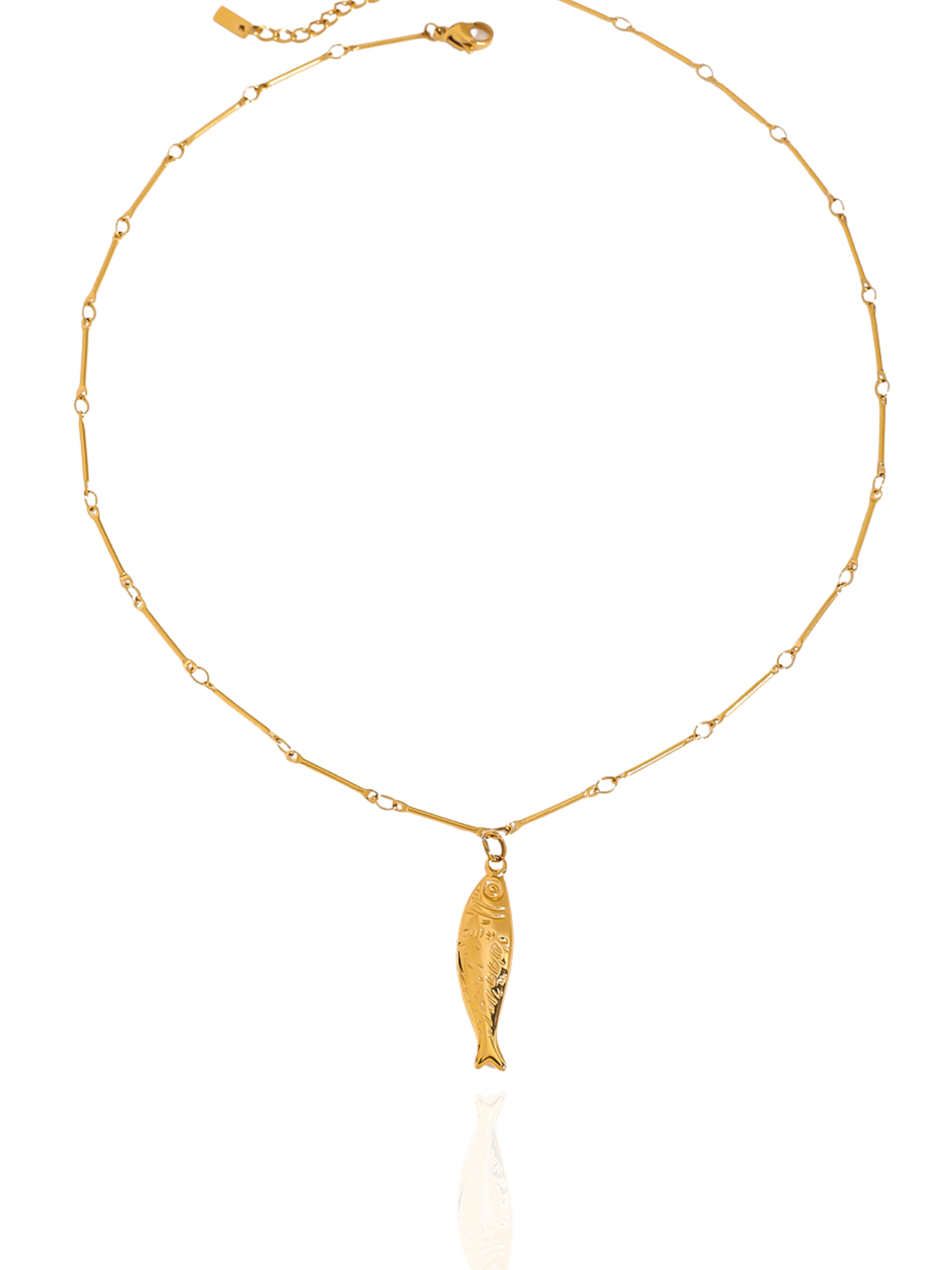 Gold necklace with a fish pendant on a white background, dainty gold fish charm necklace, lucky fish pendant, polished gold necklace, delicate fish shaped pendant