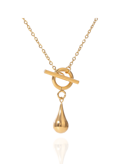 Gold necklace with a teardrop pendant on a white background, cable chain, toggle clasp, tear drop charm, polished pendants, everyday wear