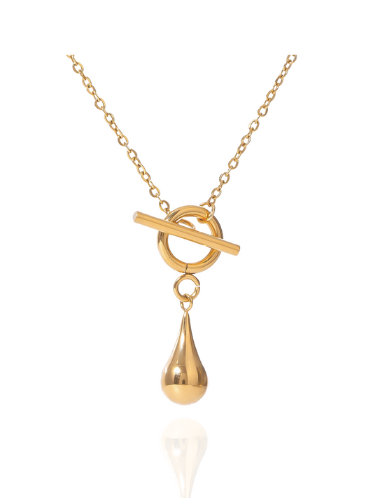 Gold necklace with a teardrop pendant on a white background, cable chain, toggle clasp, tear drop charm, polished pendants, everyday wear