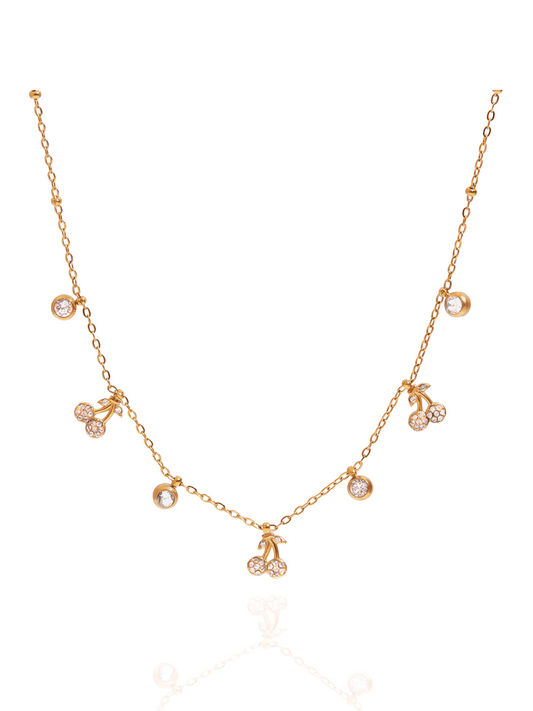 Gold necklace with cherry pendants on a white background, cherry charm necklace, everyday wear, dainty cherry motif, cute cherry charm jewellery