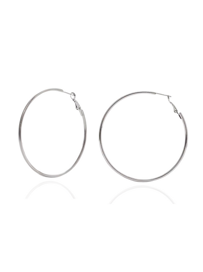 Pair of silver hoop earrings on a white background, silver hoop earrings, sterling silver hoops, polished silver hoop earrings, everyday silver hoops