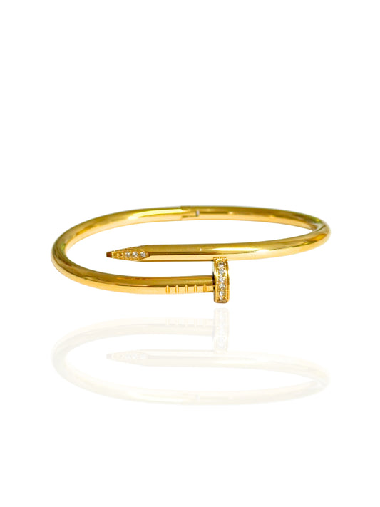 SSDXJ, gold bangle, classic bangle, unique design bangle, twisted nail bangle, nail bangle, statement bangle, versatile bangle, stackable bangle, chic bangle