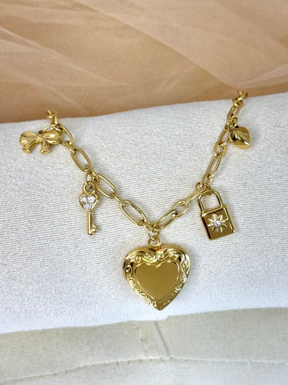 timeless jewellery, perfect gift for her, elegant bracelet, charm bracelet, best gift for her, classic gold chain bracelet, stylish gift, statement bracelet, versatile bracelet, bracelet Australia, gold bracelet, lucky charm, cute bracelet, dangling bracelet, bow design bracelet, heart design bracelet, star design bracelet, pearl bracelet, locket design bracelet
