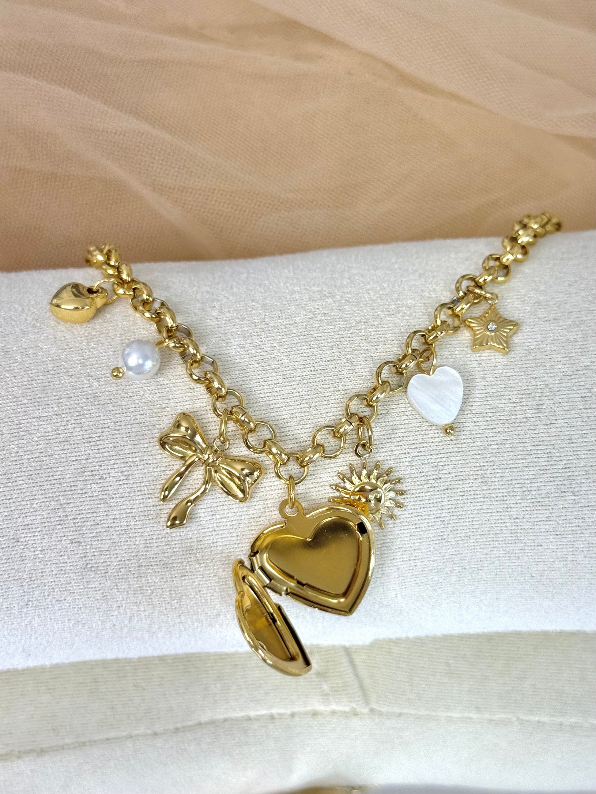 timeless jewellery, perfect gift for her, elegant bracelet, charm bracelet, best gift for her, classic gold chain bracelet, stylish gift, statement bracelet, versatile bracelet, bracelet Australia, gold bracelet, lucky charm, cute bracelet, dangling bracelet, bow design bracelet, heart design bracelet, star design bracelet, pearl bracelet