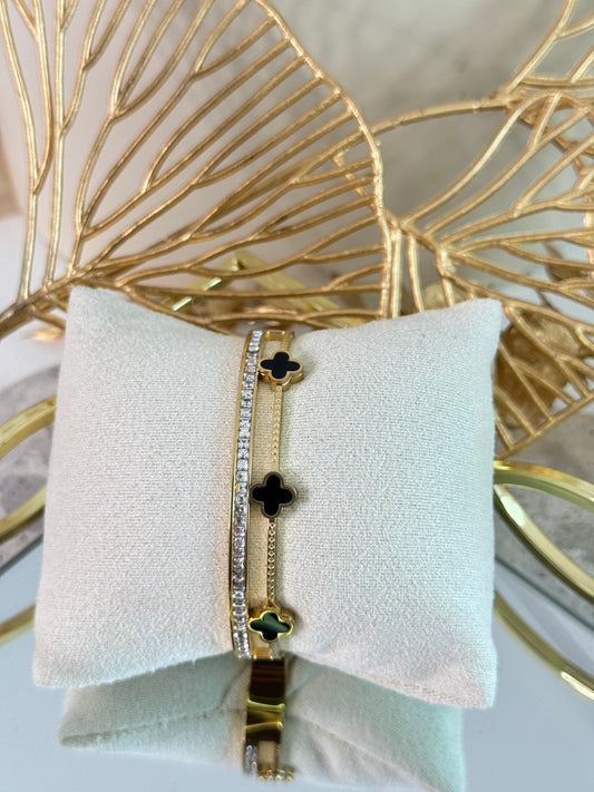timeless jewellery, perfect gift for her, elegant jewellery, dainty jewellery, simple jewellery, classic gold bangle, fashion accessories, sleek jewellery, trendy jewellery, lightweight bangle, stylish jewellery, simple bangle, flower bangle, intricate design bangle, flower bangle, clover design bangle, black bangle, black clover bangle